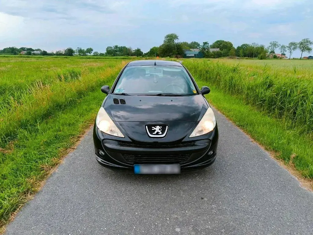 Gebraucht Peugeot 206+ 70 PS (51 kW) 2009 Schwarz Kleinwagen