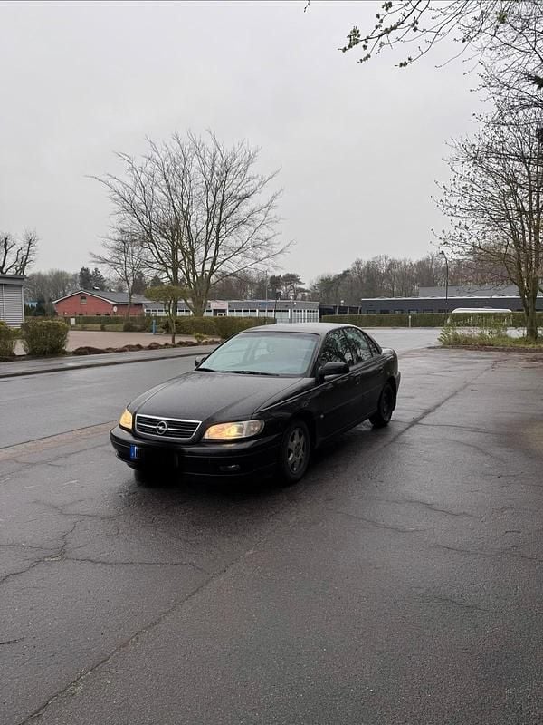 Second-hand Opel Omega 144 CP (105 kW) 2003 Negru Berlinǎ