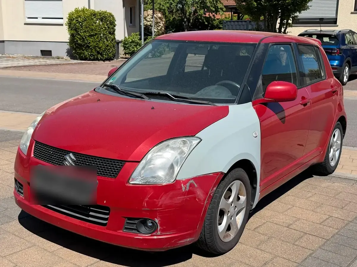 Second-hand Suzuki Swift 92 CP (67 kW) 2007 Roșu Hatchback