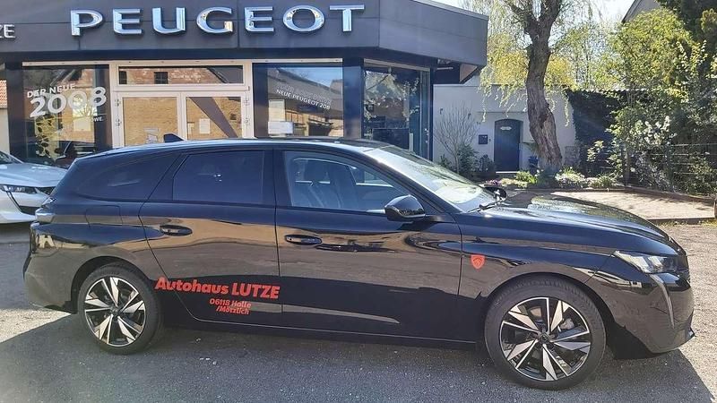 Lackierung schwarz perla nera Gebraucht 2023 Peugeot 308 Allure Kombi | 25.890 € (Fairer Preis) - Bild 1/4