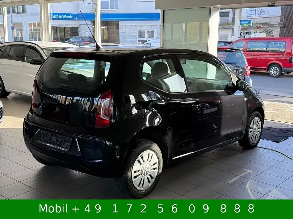 Używany VW up! Sound 60 KM (44 kW) 2011 Czarny Hatchback