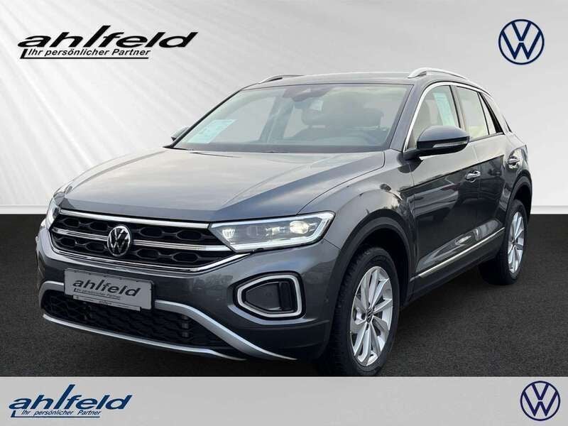 Indiumgrau Gebraucht 2024 VW T-Roc IQ Drive SUV | 39.330 € (Teuer) - Bild 1/4