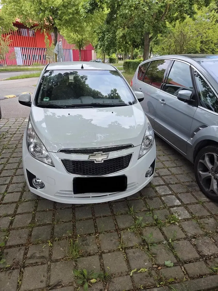 Gebraucht Chevrolet Spark 68 PS (50 kW) 2011 Weiß Kleinwagen