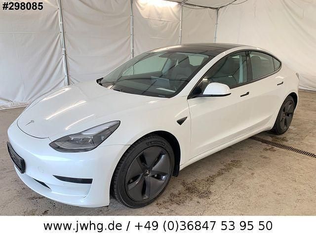 White metallic Gebraucht 2021 Tesla Model 3 Standard Range Plus Limousine | 22.750 € (Guter Preis) - Bild 1/4