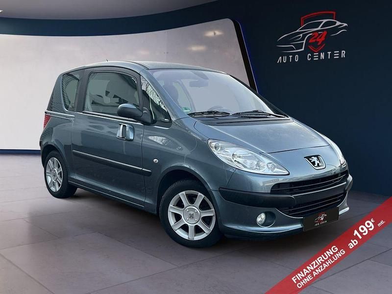Grau Gebraucht 2006 Peugeot 1007 Van / Kleinbus | 2.499 € (Fairer Preis) - Bild 1/4