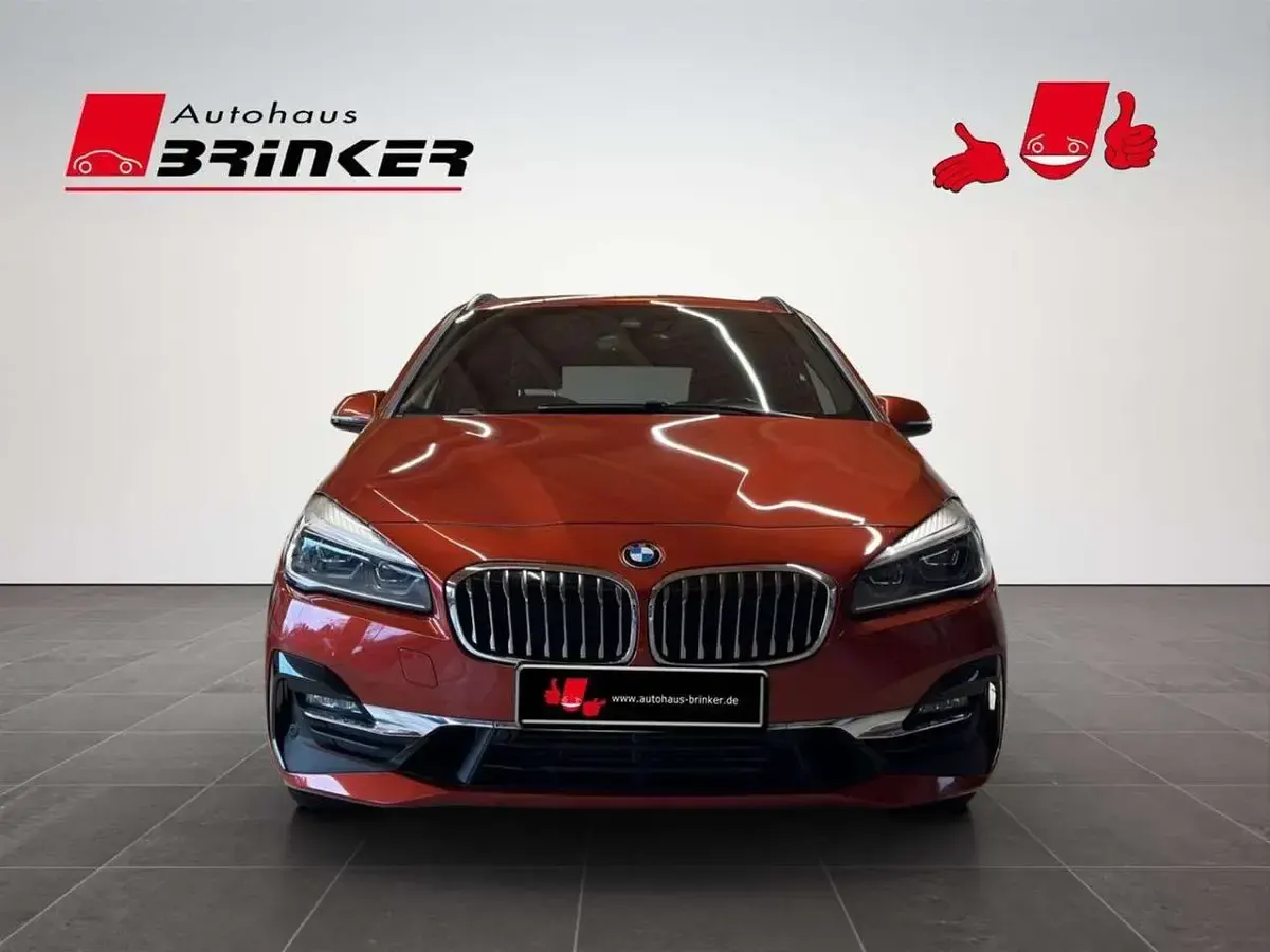 Gebraucht BMW 220 Active Tourer Luxury Line 192 PS (141 kW) 2019 Sunset orange metallic Van / Kleinbus
