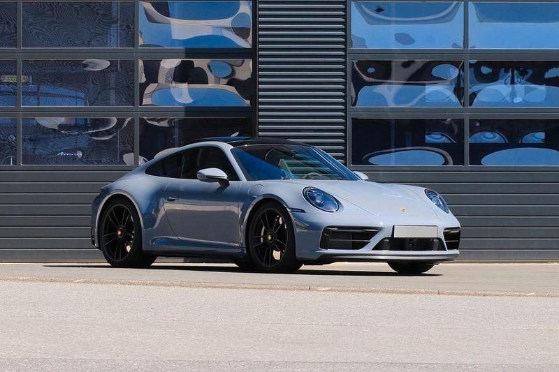 Grau Gebraucht 2023 Porsche 911 Carrera 4 GTS | 171.992 € (Teuer) - Bild 1/4