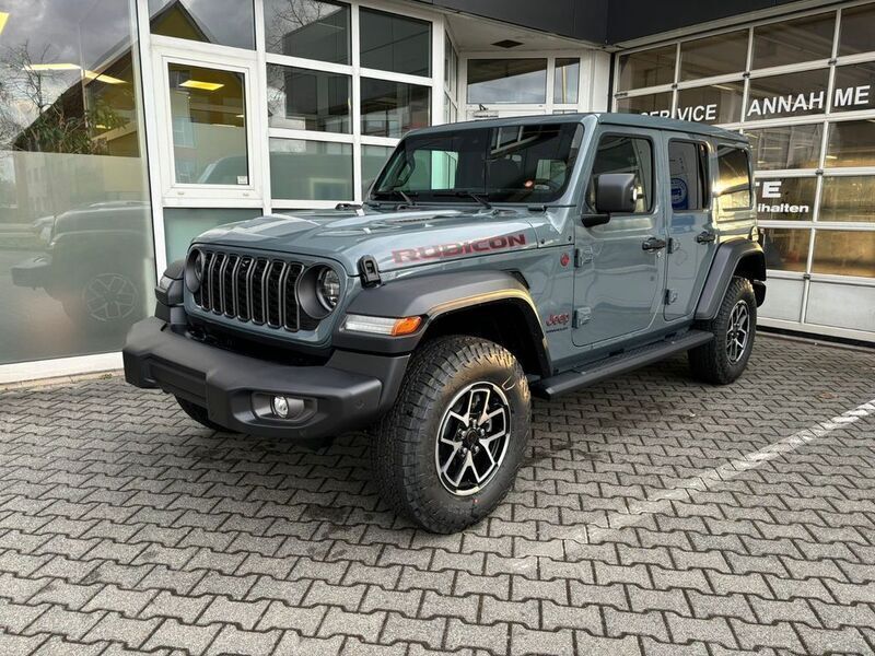 Grau Neu 2025 Jeep Wrangler Rubicon SUV | 68.300 € (Etwas zu teuer) - Bild 1/4