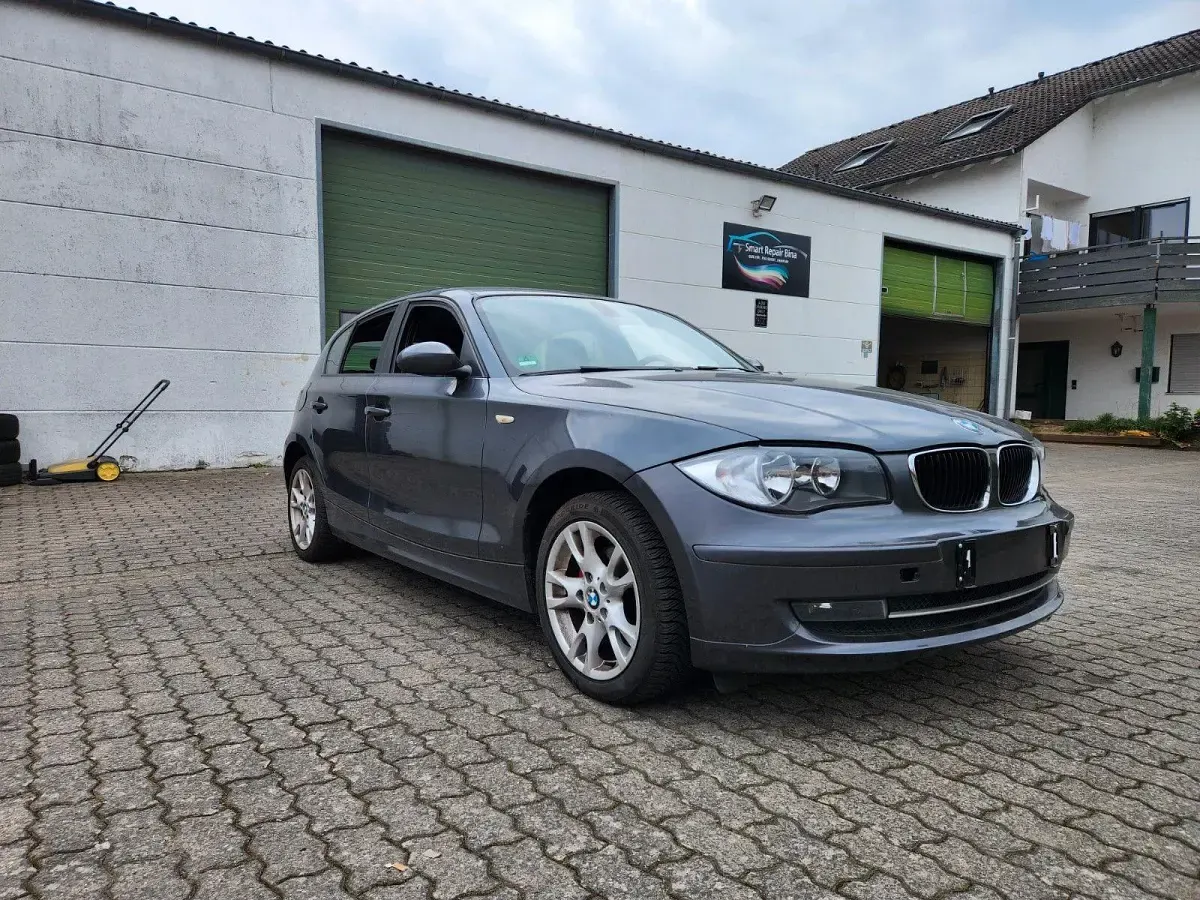 Używany BMW 116 122 KM (89 kW) 2008 Szary Hatchback