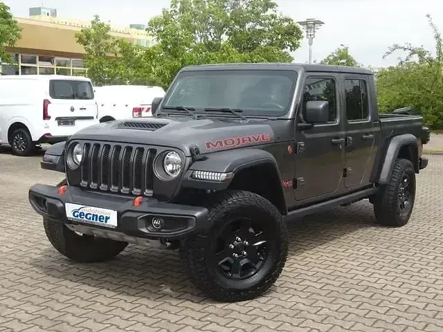 Gebraucht Jeep Gladiator 290 PS (213 kW) 2023 Granite crystal met. clear coa Pickup