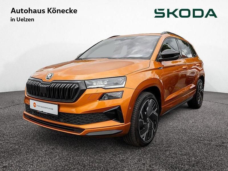 Orange Gebraucht 2022 Skoda Karoq SportLine SUV | 28.560 € - Bild 1/4