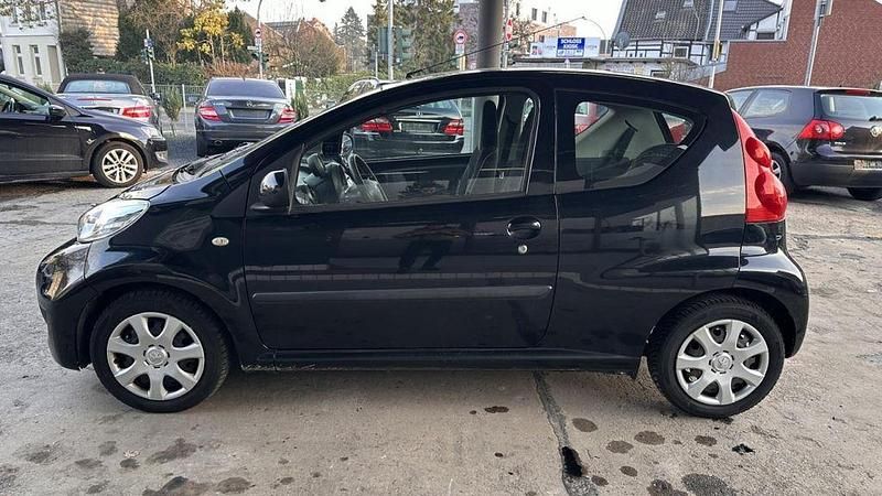Gebraucht Peugeot 107 Filou 68 PS (50 kW) 2012 Schwarz Kleinwagen