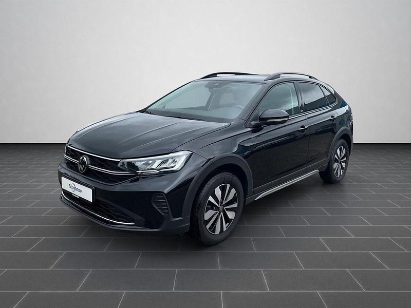 Deep black perleffekt (metallic) Gebraucht 2024 VW Taigo Move SUV | 25.580 € (Guter Preis) - Bild 1/4