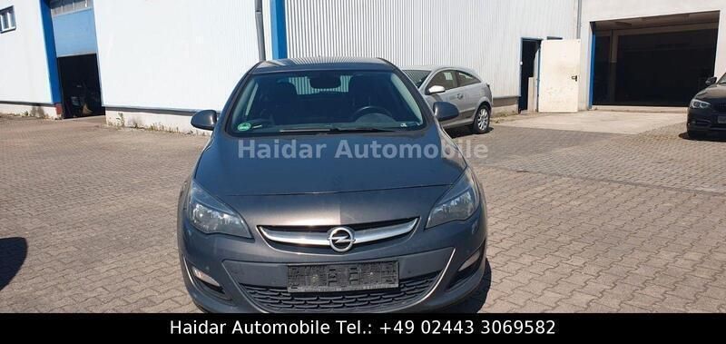 Grau Gebraucht 2013 Opel Astra Kleinwagen | 1.490 € - Bild 1/4