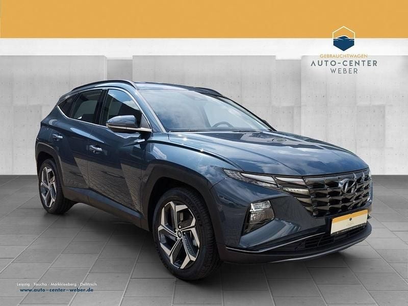 Blau (metallic) Gebraucht 2022 Hyundai Tucson SUV | 27.290 € (Superpreis) - Bild 1/4