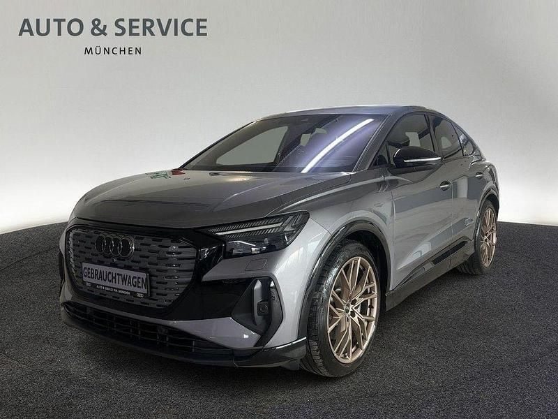 Grau Gebraucht 2022 Audi Q4 Sportback e-tron Sport SUV | 36.360 € (Fairer Preis) - Bild 1/4