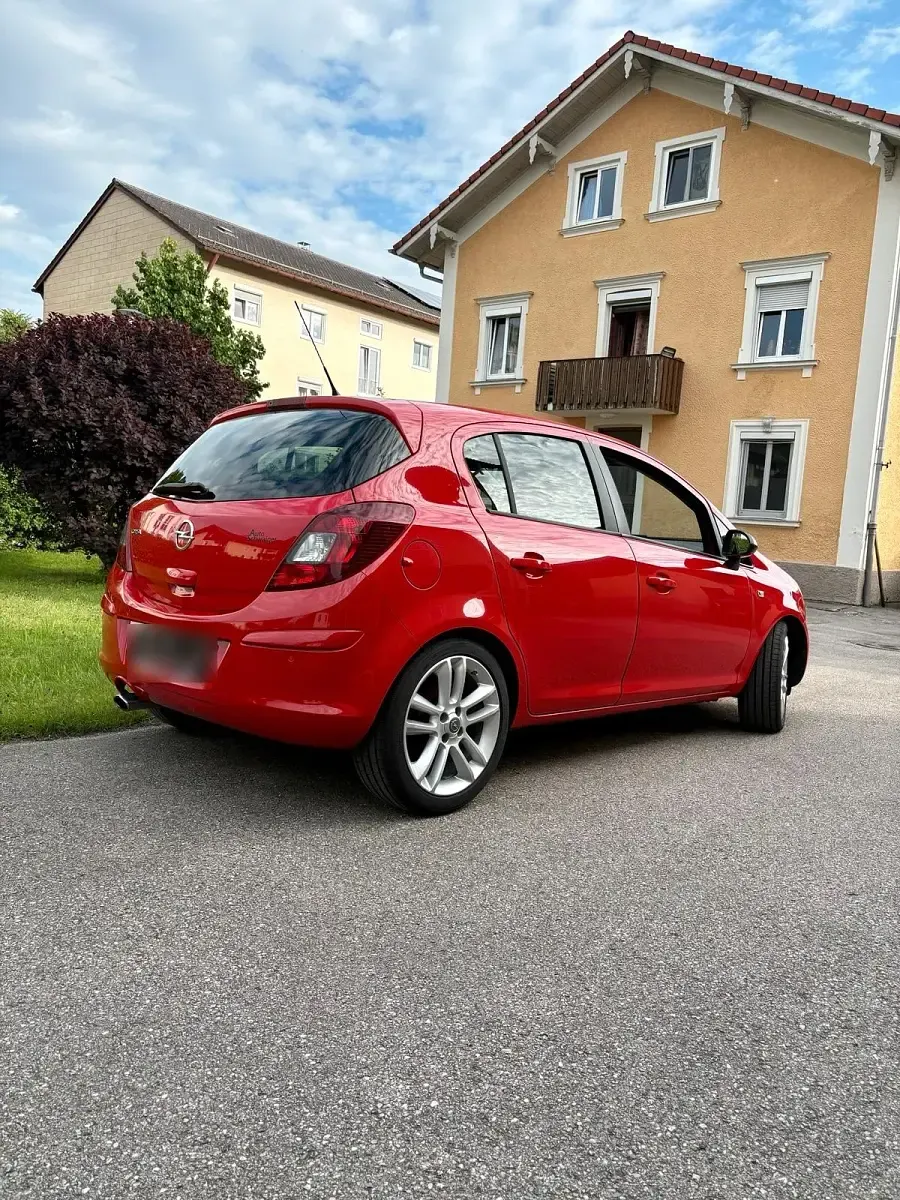 Gebraucht Opel Corsa 101 PS (74 kW) 2014 Rot Kleinwagen