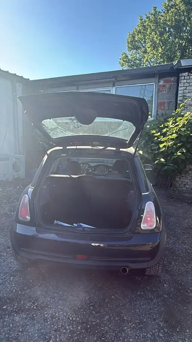 Gebraucht Mini Cooper 90 PS (66 kW) 2004 Schwarz Kleinwagen
