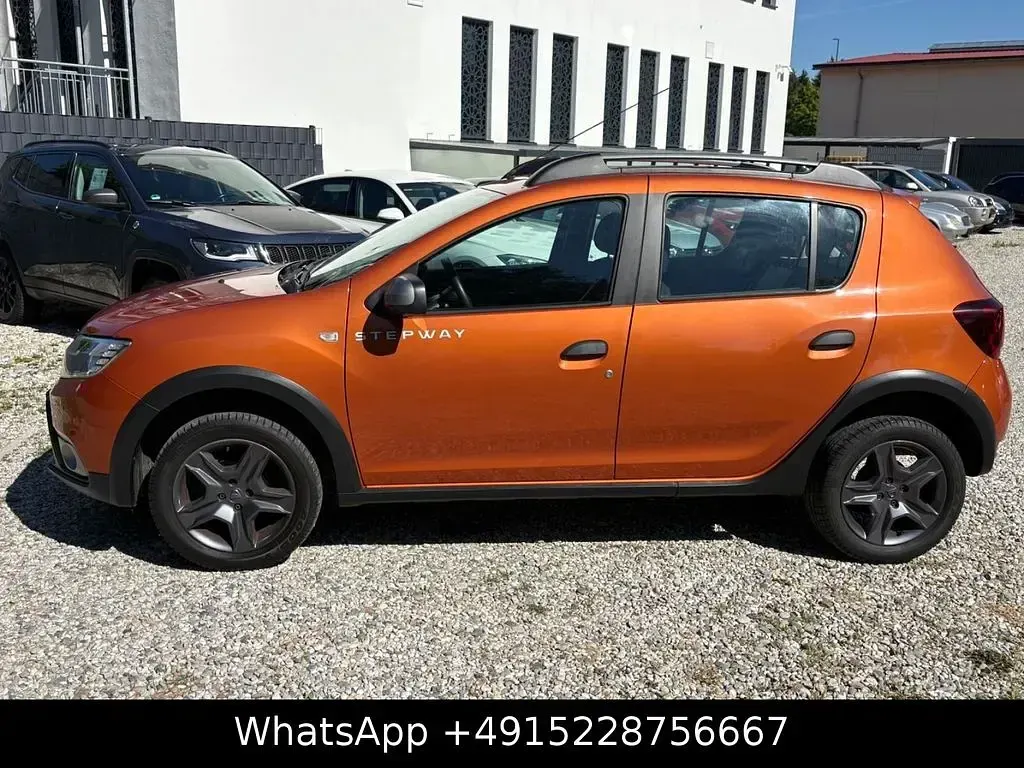 Gebraucht Dacia Sandero Celebration 90 PS (66 kW) 2018 Orange Limousine