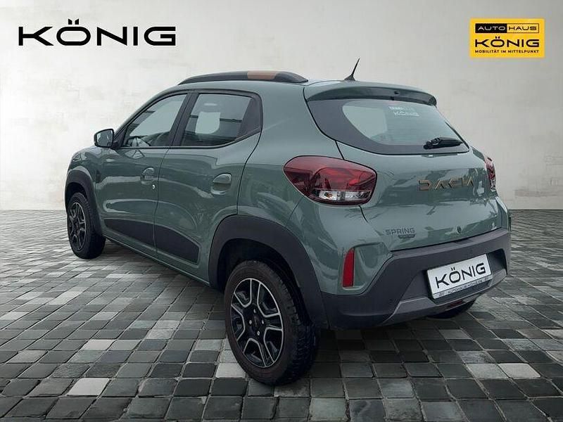 Gebraucht Dacia Spring Extreme 47 kW (65 PS) 2023 Grün "flechtengrau" Kleinwagen