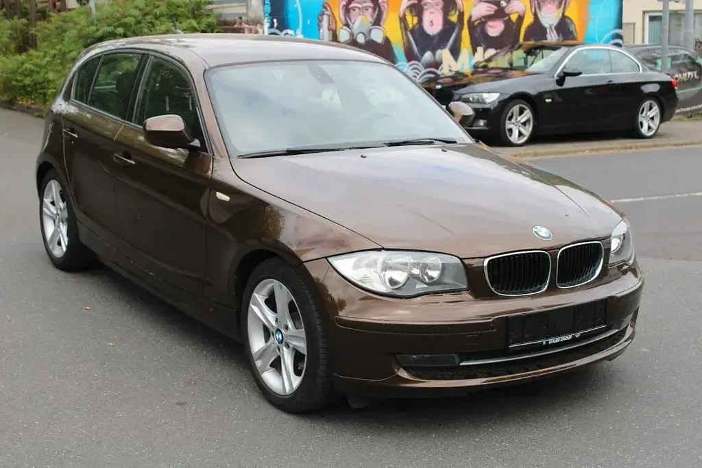 Używany BMW 116 122 KM (89 kW) 2011 Brązowy Hatchback