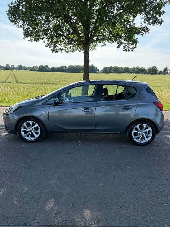 Grau Gebraucht 2015 Opel Corsa Limousine | 4.999 € (Guter Preis) - Bild 1/4