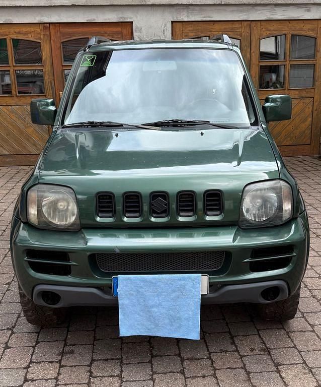 Grün Gebraucht 2009 Suzuki Jimny SUV | 5.800 € (Superpreis) - Bild 1/4