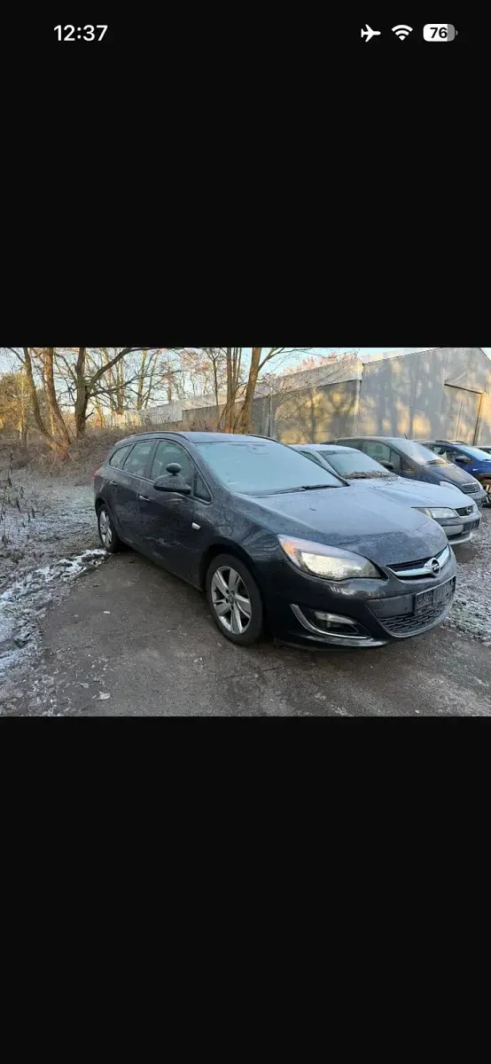 Gebraucht Opel Astra 110 PS (80 kW) 2013 Grün Kombi
