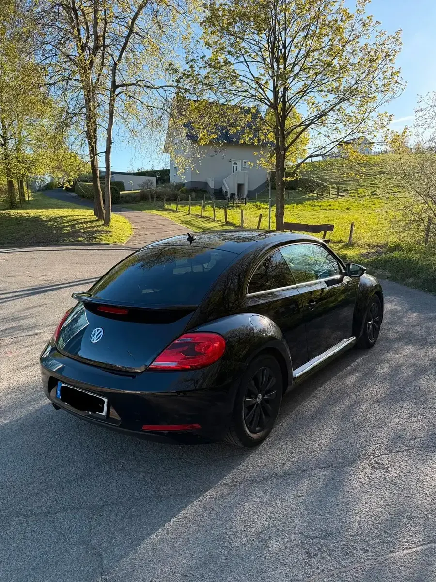 Gebraucht VW Beetle Exclusive 105 PS (77 kW) 2013 Schwarz Kleinwagen