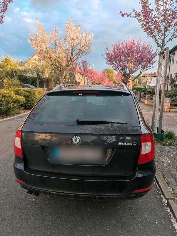 Second-hand Skoda Superb 170 CP (125 kW) 2012 Negru Break