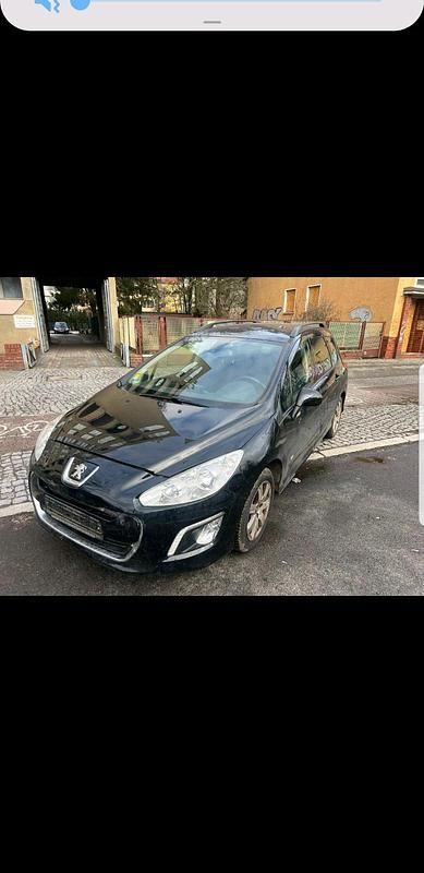 Gebraucht Peugeot 308 120 PS (88 kW) 2013 Schwarz Kombi