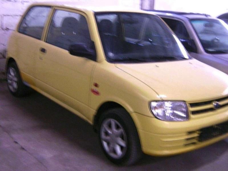 Gebraucht Daihatsu Cuore 56 PS (41 kW) 2000 Gelb Kleinwagen