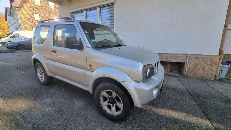 Grau Gebraucht 2005 Suzuki Jimny Ranger SUV | 3.490 € (Fairer Preis) - Bild 1/4
