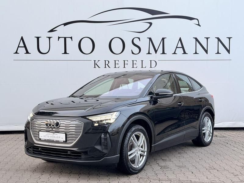 Mythosschwarz metallic Gebraucht 2022 Audi Q4 Sportback e-tron Sport SUV | 27.950 € (Fairer Preis) - Bild 1/4