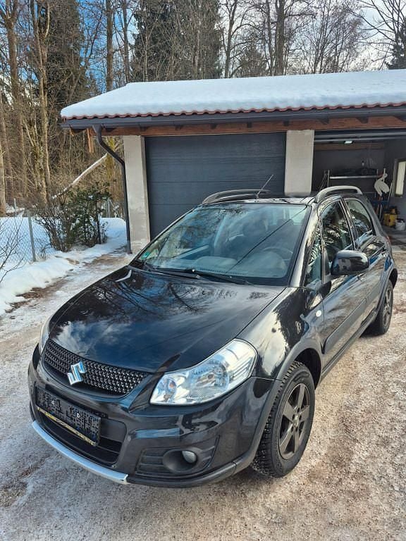 Schwarz Gebraucht 2014 Suzuki SX4 Limousine | 7.250 € (Superpreis) - Bild 1/4