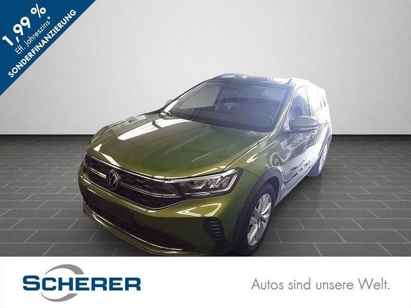 Visual green metallic Gebraucht 2024 VW Taigo Life SUV | 26.450 € (Fairer Preis) - Bild 1/4