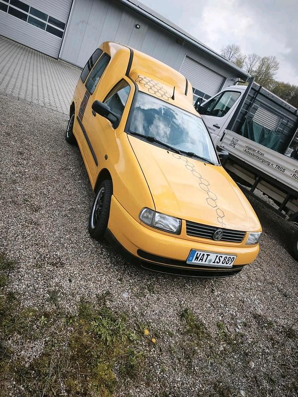 Second-hand VW Caddy 60 CP (44 kW) 2001 Galben Monovolum