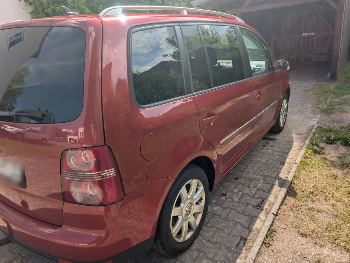 Używany VW Touran 140 KM (102 kW) 2007 Czerwony Minivan