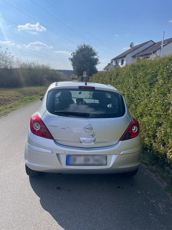 Second-hand Opel Corsa 87 CP (63 kW) 2013 Argintiu Hatchback