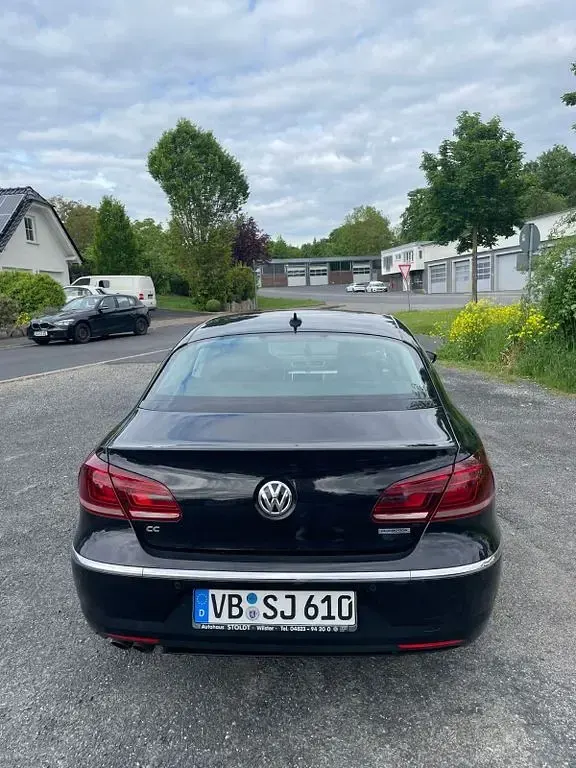 Używany VW CC 170 KM (125 kW) 2012 Czarny Sedan/Limuzyna