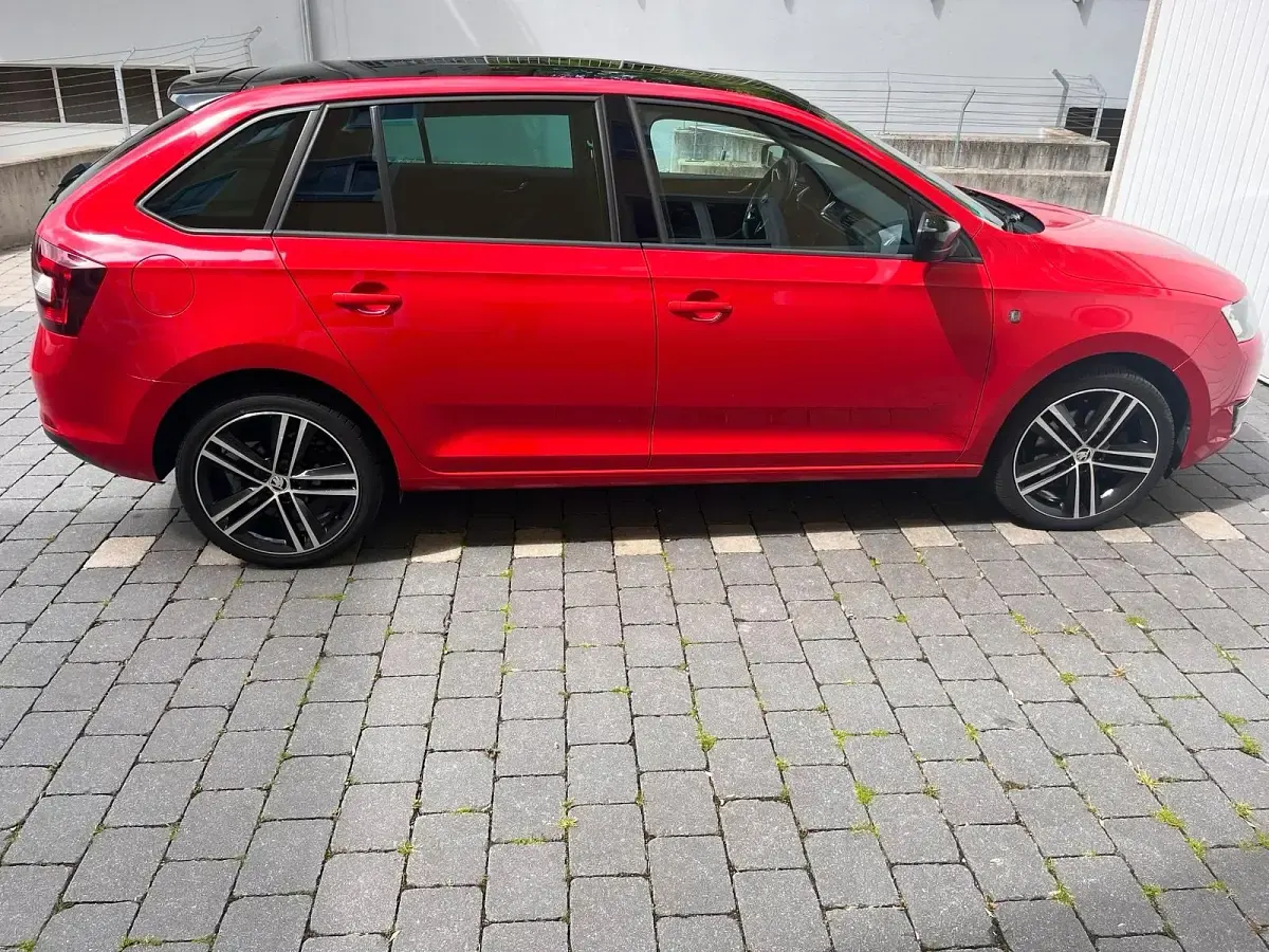 Używany Skoda Rapid Ambition 105 KM (77 kW) 2014 Czerwony Hatchback