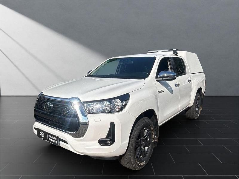Weiss Gebraucht 2022 Toyota HiLux Comfort Abholung | 34.950 € (Etwas zu teuer) - Bild 1/2