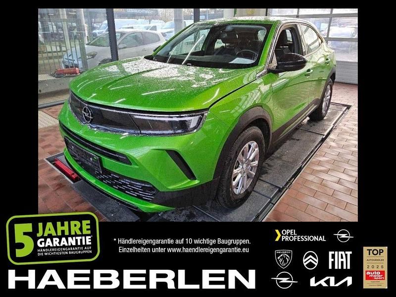 Gebraucht Opel Mokka-e Elegance 100 kW (136 PS) 2022 Matcha green/ikone gruen (metallic) SUV