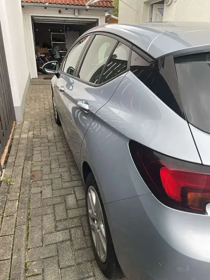 Używany Opel Astra Edition 105 KM (77 kW) 2015 Szary Hatchback