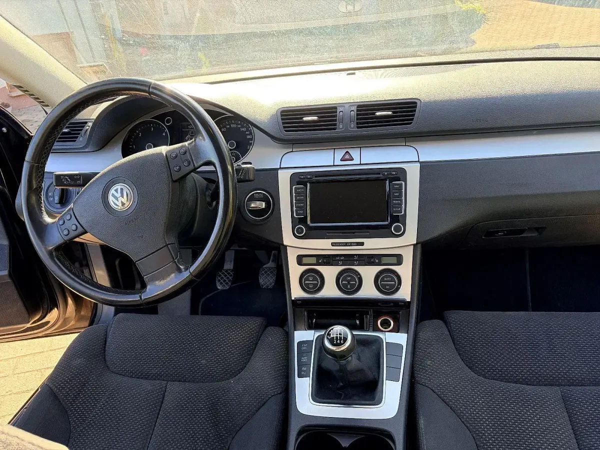Second-hand VW Passat 140 CP (102 kW) 2009 Negru Break