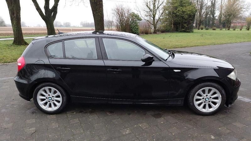 Gebraucht BMW 116 122 PS (89 kW) 2009 Schwarz Kleinwagen