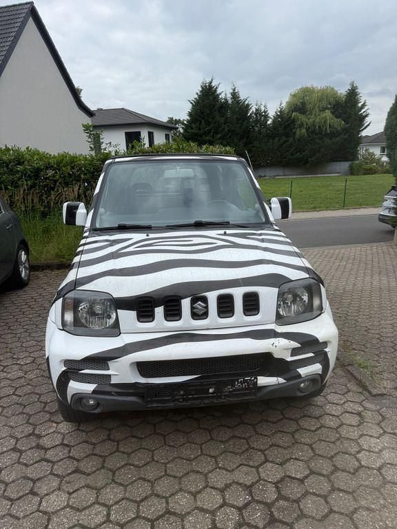 Schwarz Gebraucht 2007 Suzuki Jimny SUV | 5.699 € (Superpreis) - Bild 1/4