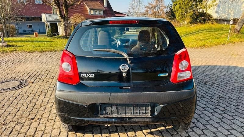 Gebraucht Nissan Pixo 65 PS (47 kW) 2011 Schwarz Kleinwagen