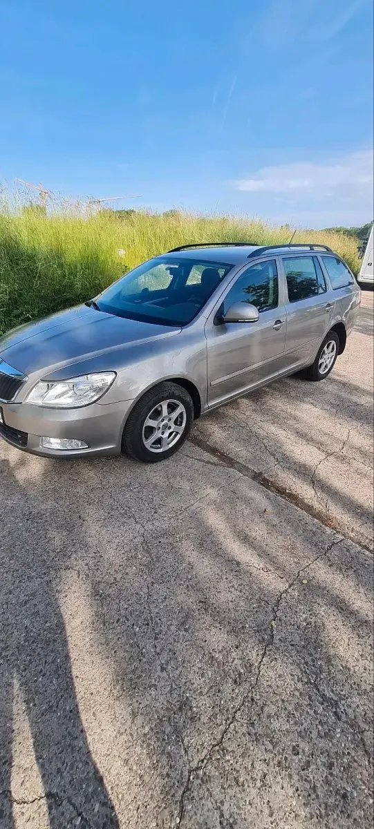 Używany Skoda Octavia 122 KM (89 kW) 2011 Żółty Kombi
