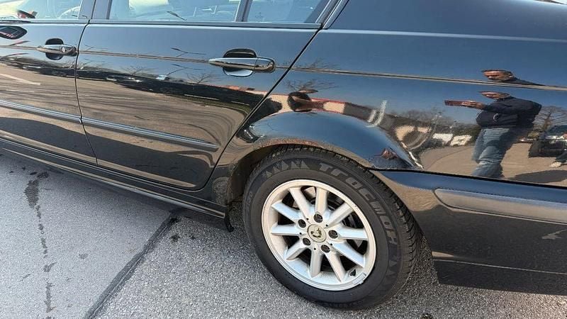 Gebraucht BMW 316 105 PS (77 kW) 2000 Schwarz Limousine